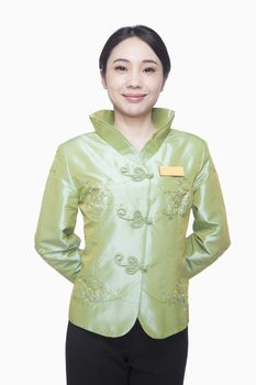 Restaurant/Hotel Hostess in Traditional Chinese Clothing, Hands Behind Back