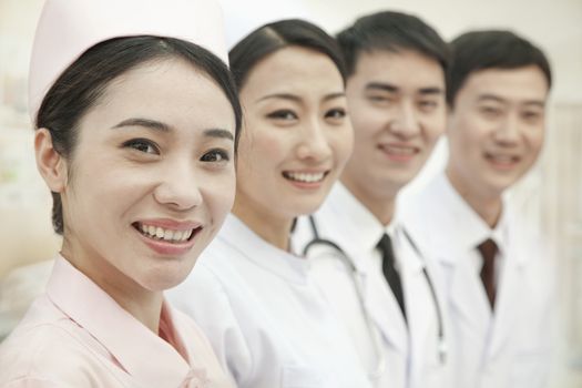 Healthcare workers standing in a row, China