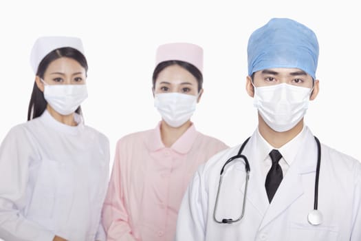 Portrait of Healthcare workers with surgical masks, studio shot