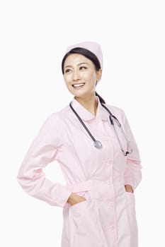 Portrait of young nurse, studio shot, China