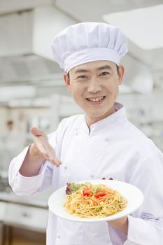 Chef showing prepared food 