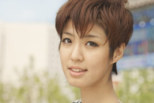 Close up portrait of young woman smiling