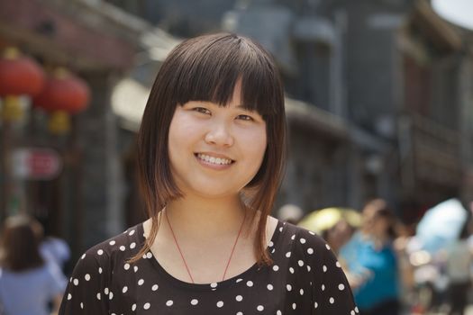 Portrait of young girl in Beijing outdoors