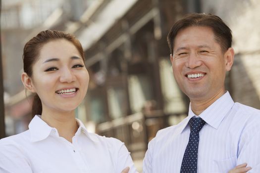 Portrait of two Business People, outdoors, Beijing