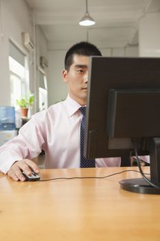 Businessmen working on his computer
