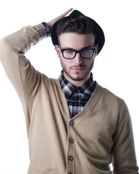 Handsome and stylish young man with black fedora hat and glasses, isolated on white