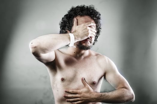 sick man with hospital bracelet, infection