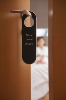 Do not disturb sign on the door