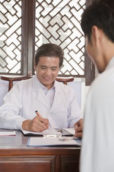 Doctor Meeting with a Patient