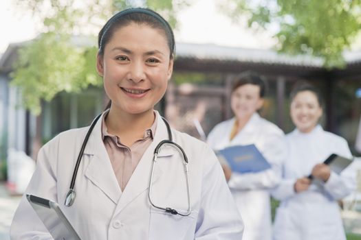 Portrait of Doctor in Courtyard