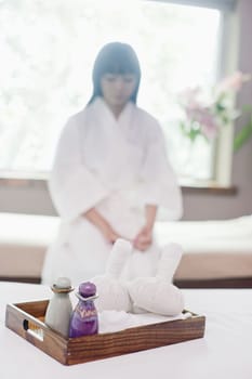 Woman at Spa with Herbs and Oils