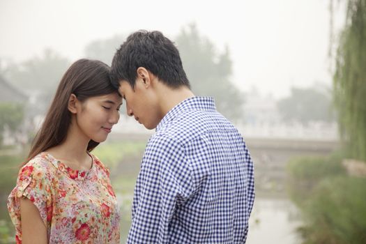 Affectionate Couple By a Canal