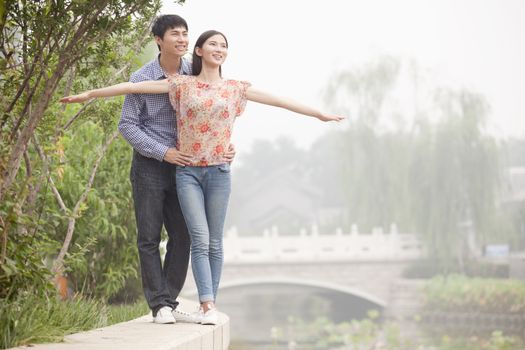 Boyfriend and Girlfriend by a Canal