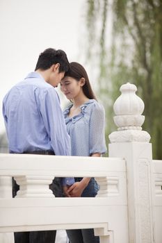 Young Couple Touching Foreheads