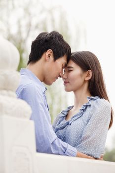 Young Couple Touching Foreheads