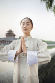 Young Woman Practicing Tai Ji