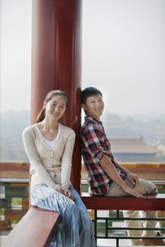 Portrait Of Young Chinese Couple In Jing Shan Park