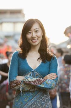 Portrait Of Smiling Mid Adult Woman In Houhai, Beijing