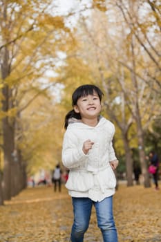 Young girl playing in park