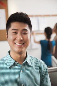 Portrait of young businessman in the office