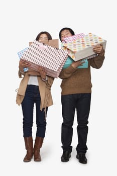 Couple carrying shopping bags