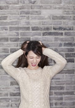 Young Woman Pulling Her Hair