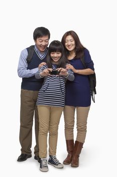 Family taking picture with digital camera