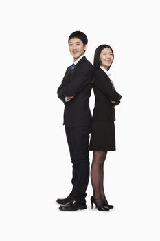 Businessman and businesswomen standing back to back