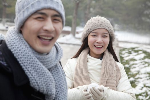 Couple Playing in the Snow