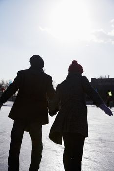 Young couple at ice rink