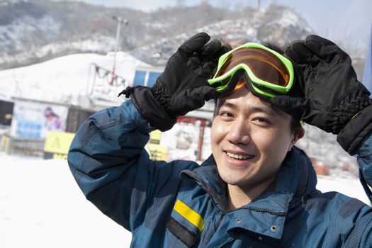 Smiling Man in Ski Resort