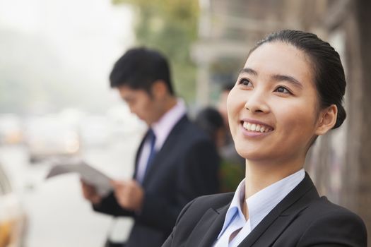 Young Cheerful Businesswoman in Beijing, China, portrait