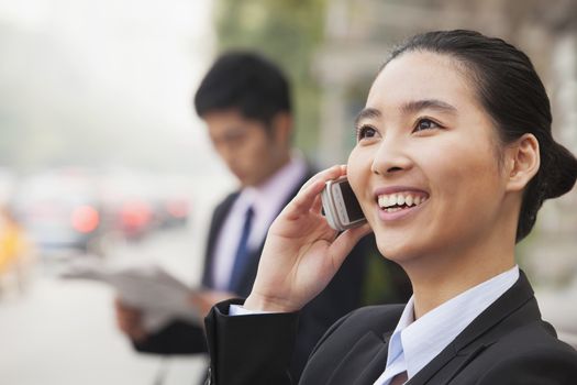 Young Businesswoman on the phone, Beijing, China