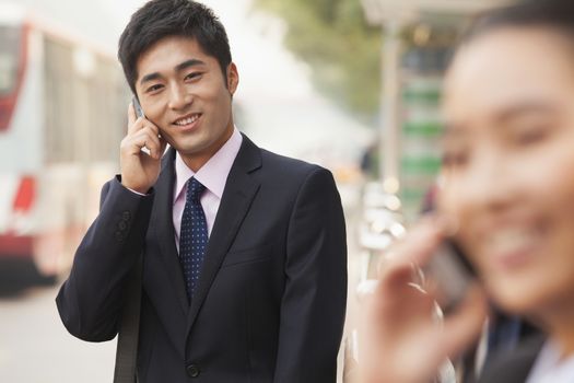 Young Businessman on the phone, portrait, Beijing