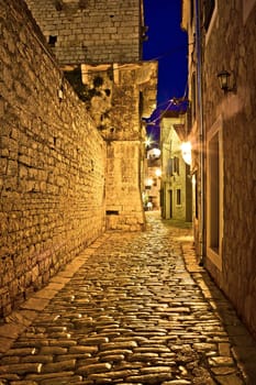 Narrow stone street in Vodice, Dalmatian architecture, Croatia