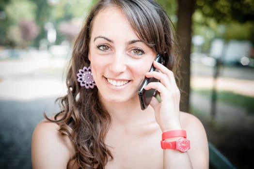 beautiful woman on the phone in the city