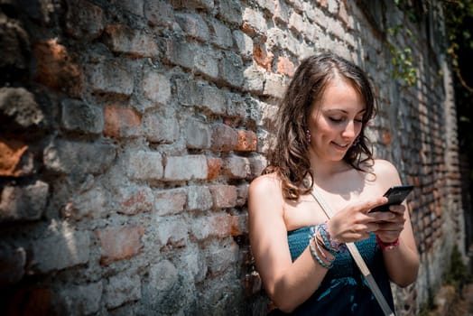 beautiful woman on the phone in the city