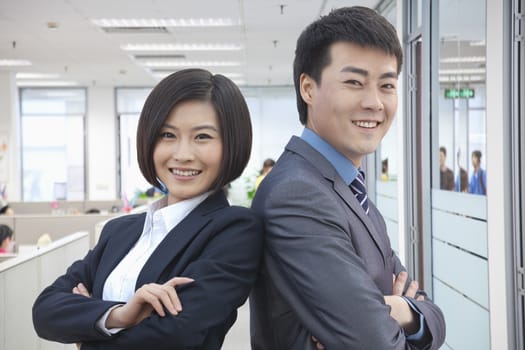 Two Business People with Arms Crossed