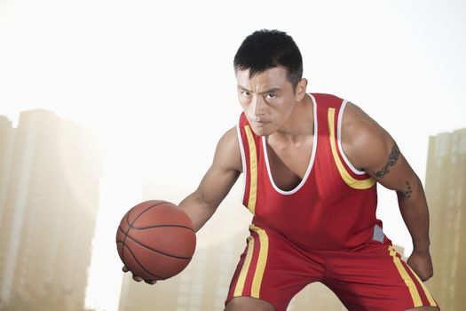 Basketball player, cityscape background