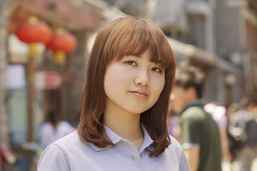 Portrait of young girl in Beijing outdoors