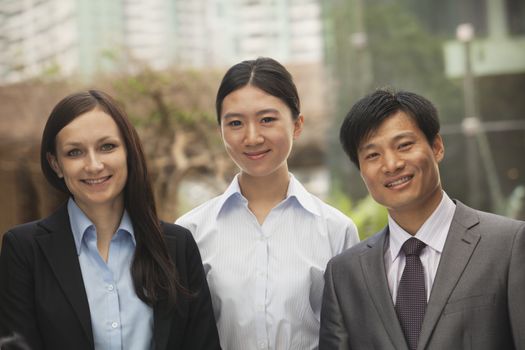Portrait of three business people, multi-ethnic group