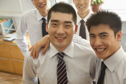 Businessmen smiling 