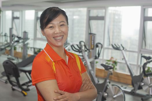 Woman  standing in the gym 