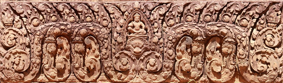 There are a lot of bas-relief on the wall of building at Banteay srei