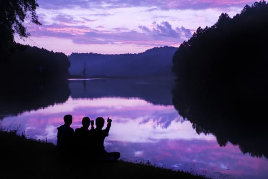 Friend-Family sitting to see beautiful landscape
