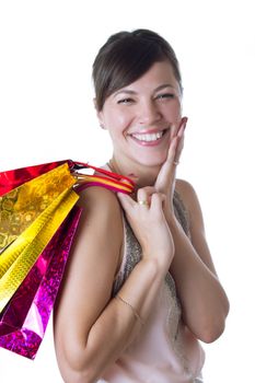 Happy woman with shopping bags isolated on white
