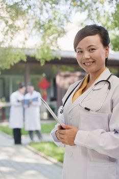 Portrait of Doctor in Courtyard