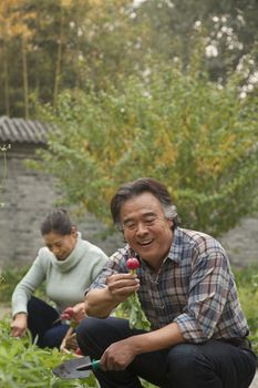 Senior couple in garden