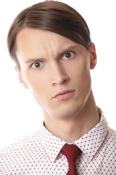 Serious man with necktie on a white background