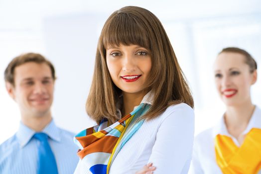 young successful business woman receiving congratulations from his colleagues